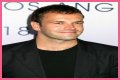 Jonny Lee Miller flashes ink for Ellen charity